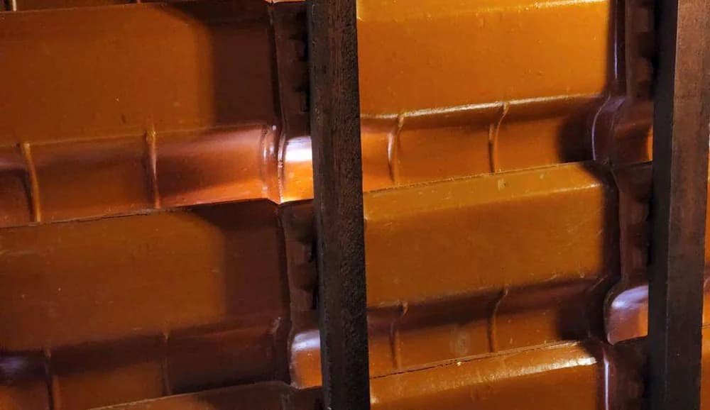 Sobreposição insuficiente das telhas